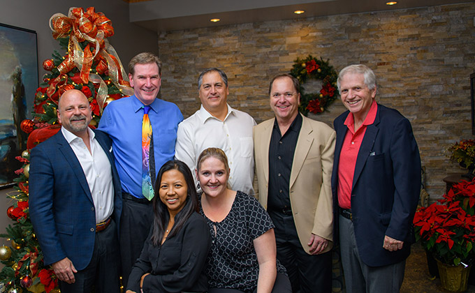 Dr. Robert Zehr with members of the Landmark Hospitals team.