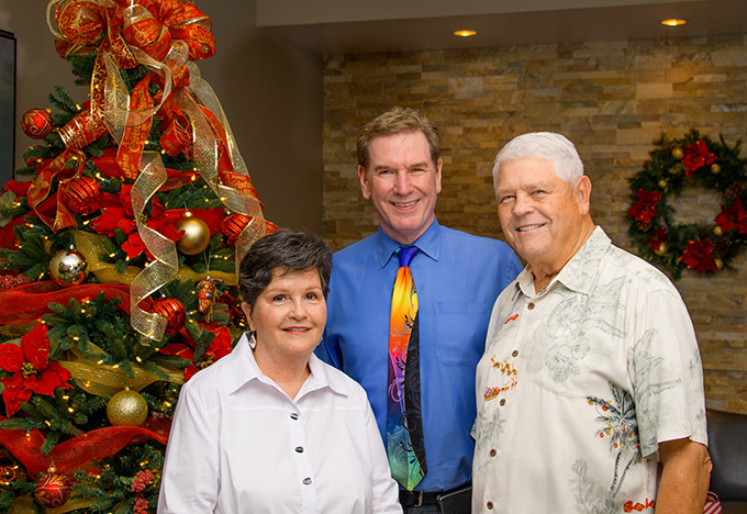 Dr. Robert Zehr with ZCO patient Mary Hart and Mary's husband Jim, former St. Louis (now Arizona) Cardinals quarterback Jim Hart